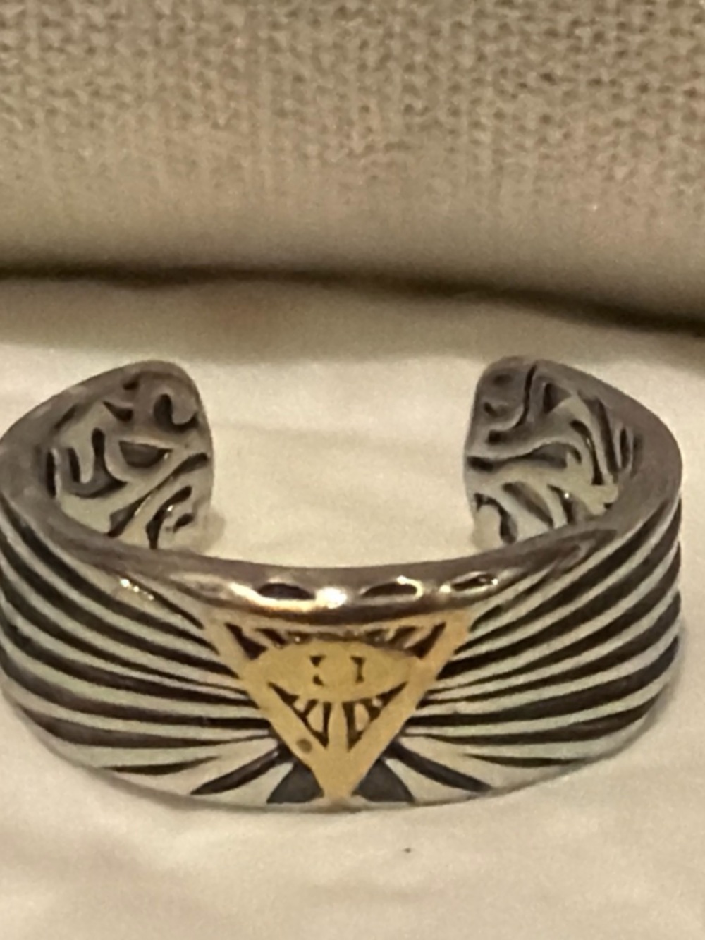 Silver ring with gold triangle accent